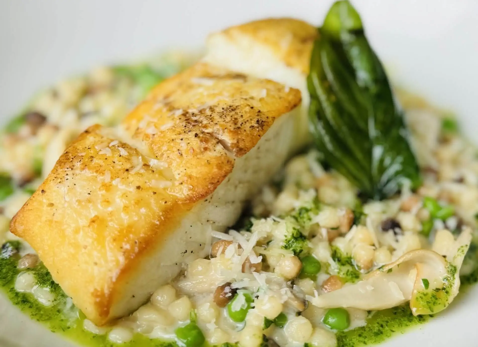 Fresh Alaskan Halibut with herbs at Waterfront restaurant Ray's Boathouse